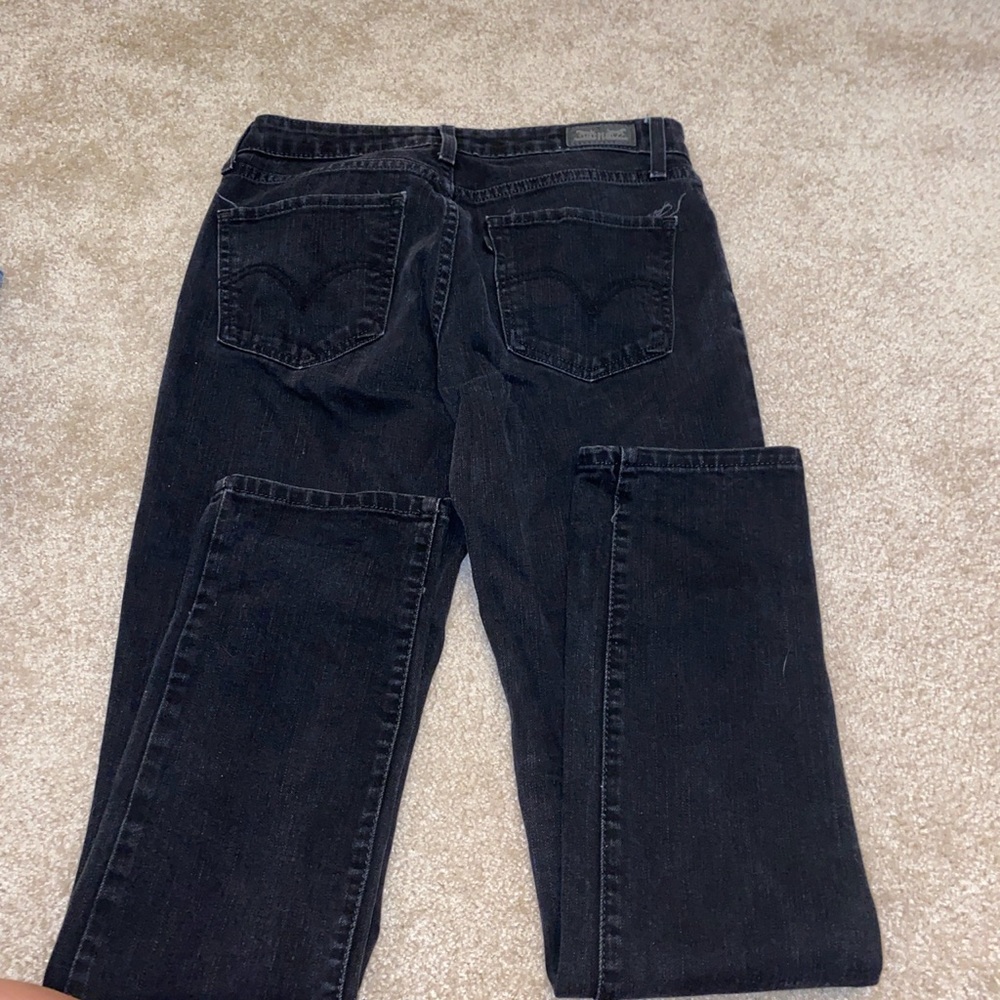 Levis mid rise skinny black denim pants size 29